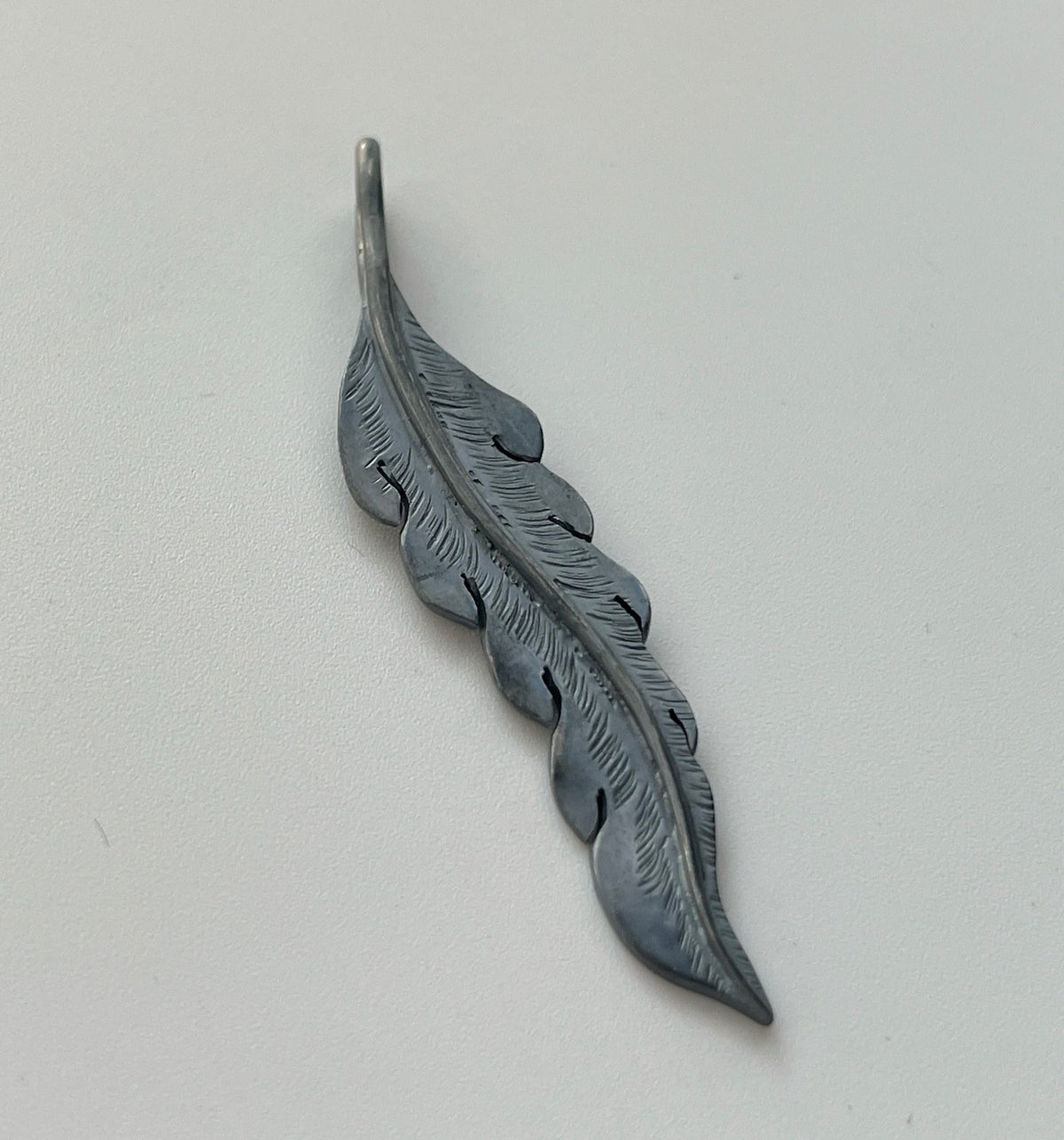 PE-0032/une-une feather